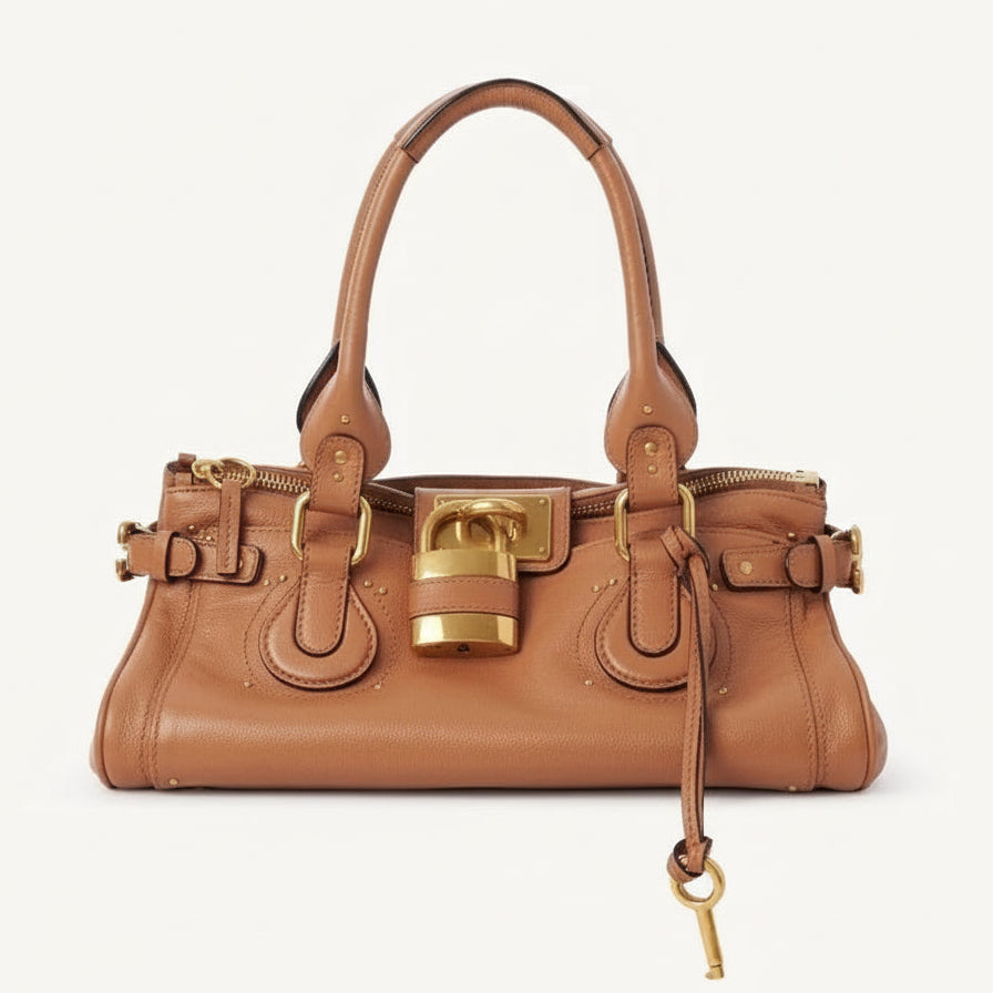 Bolsa Feminina de Mão em Couro com Detalhes Dourados