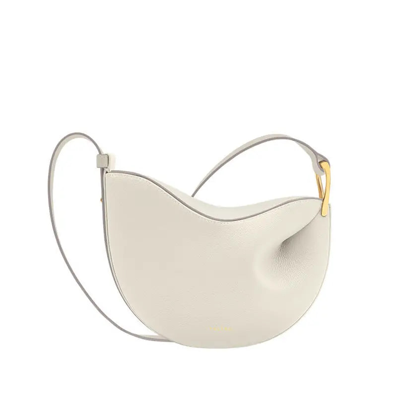 Bolsa feminina branca com design minimalista, feita em couro ecológico premium. Ideal para looks elegantes