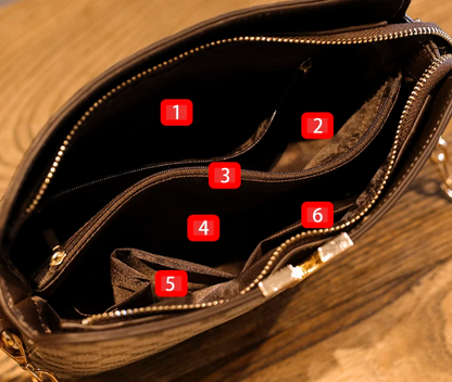 Bolsa Feminina Monograma Marrom com Alça Transversal e Detalhe Dourado